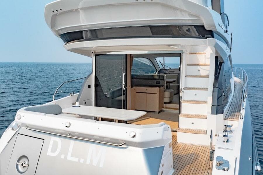 2023 Azimut Fly 53 yacht with open deck and luxurious interior on the ocean.