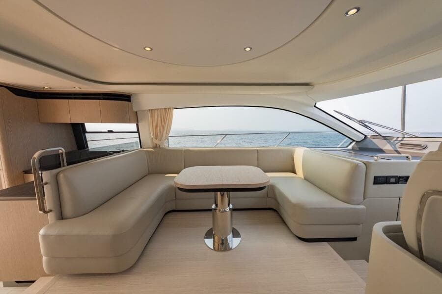 Luxurious interior of 2023 Azimut Fly 53 yacht with elegant seating and ocean view.