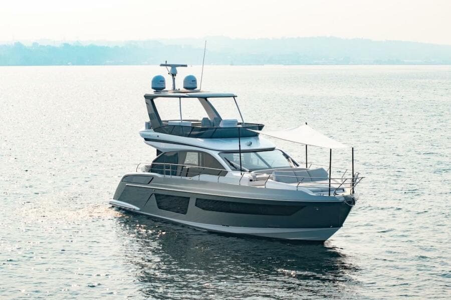 2023 Azimut Fly 53 yacht cruising on calm waters.
