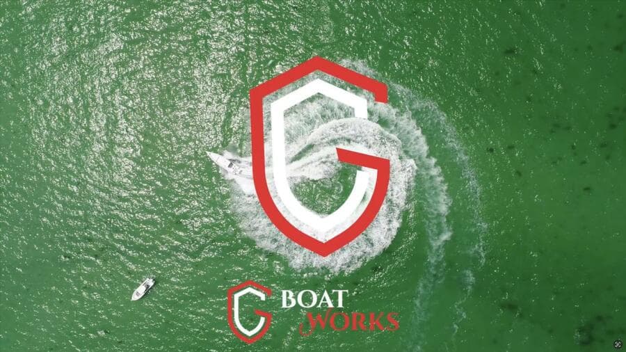 Aerial view of CG Boat Works 2023 35 M-Series on green water.