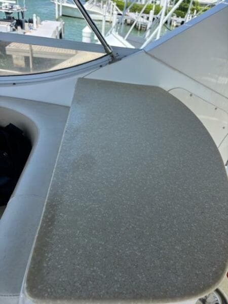 2006 Carver 43 Motor Yacht interior detail with a sleek countertop and marina view.