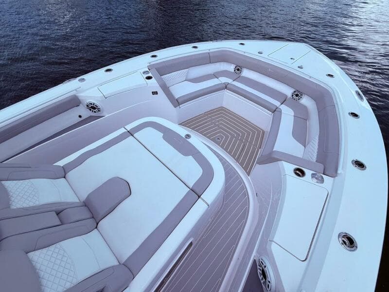 Luxurious seating area on 2024 Scout 400 LXF boat, featuring elegant design and spacious layout.