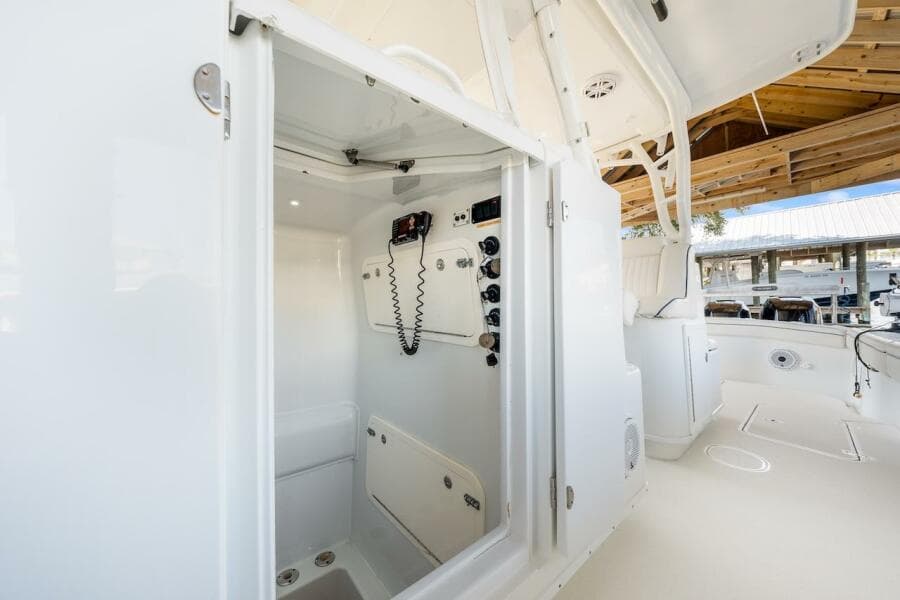 2015 Yellowfin 39 boat interior with control panel and seating area.