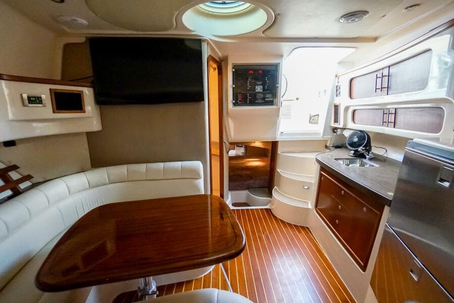 Luxurious 2007 Grady-White Express 360 yacht interior with wood flooring and modern amenities.