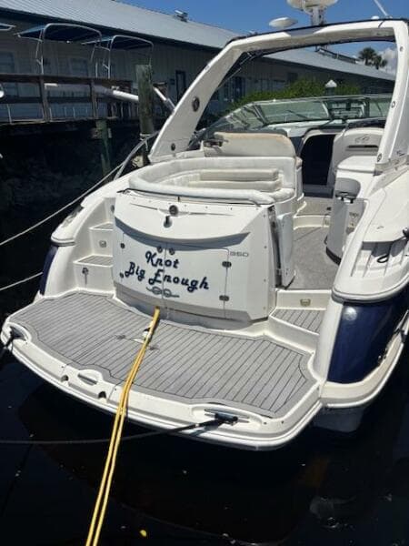2007 Monterey 350 Sport Yacht docked, rear view with "Knot Big Enough" text.
