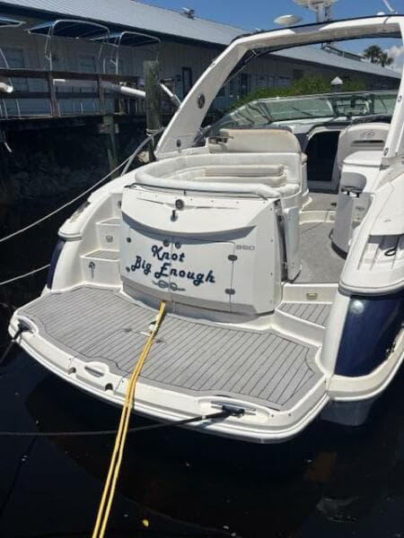 2007 Monterey 350 Sport Yacht docked, rear view with "Knot Big Enough" text.