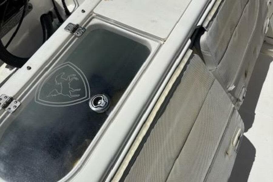 2018 Century 2600 Center Console boat interior with storage compartment.