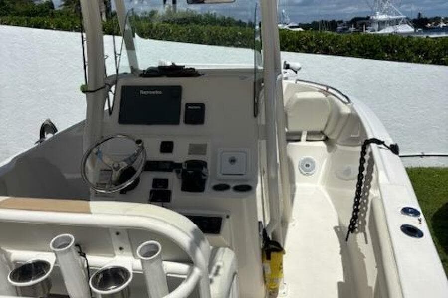 2018 Century 2600 Center Console boat with modern dashboard and spacious deck.