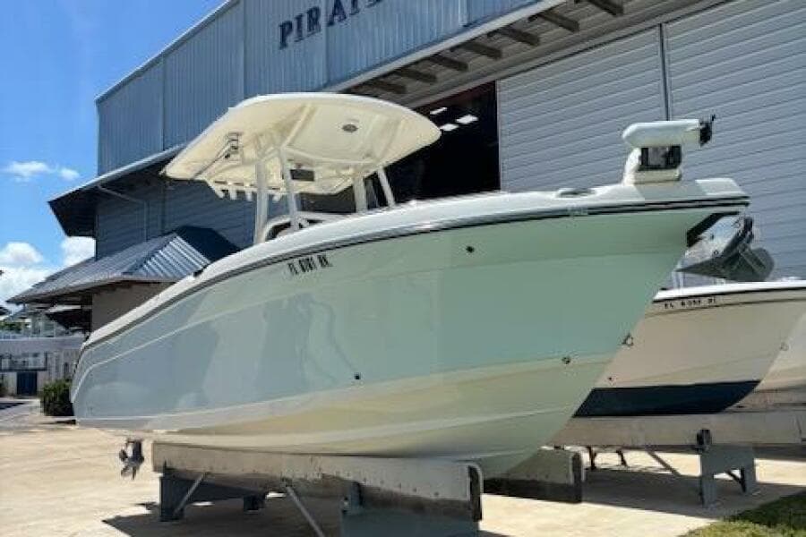 2018 Century 2600 Center Console boat on display outside a warehouse.