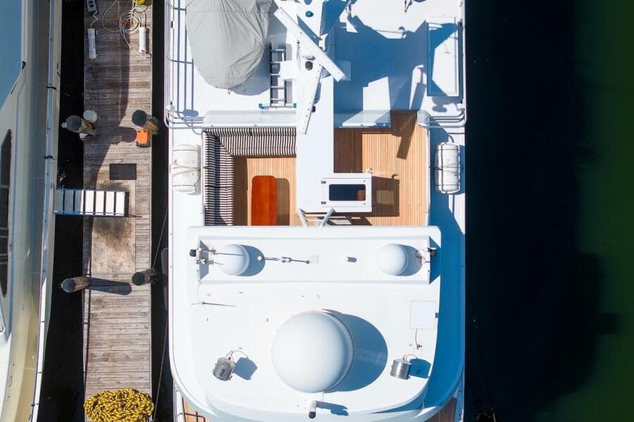 Aerial view of 1996 ABD 90 Explorer yacht docked at a marina.