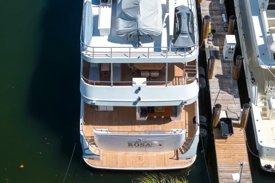 Aerial view of 1996 ABD 90 Explorer yacht docked at marina.