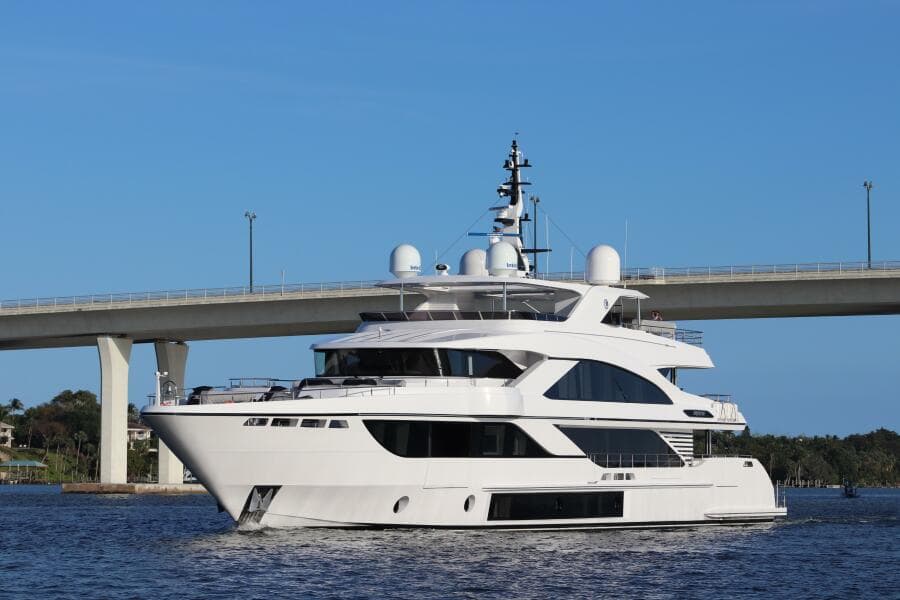 Luxury Majesty 140 yacht cruising under a bridge, 2020 model.