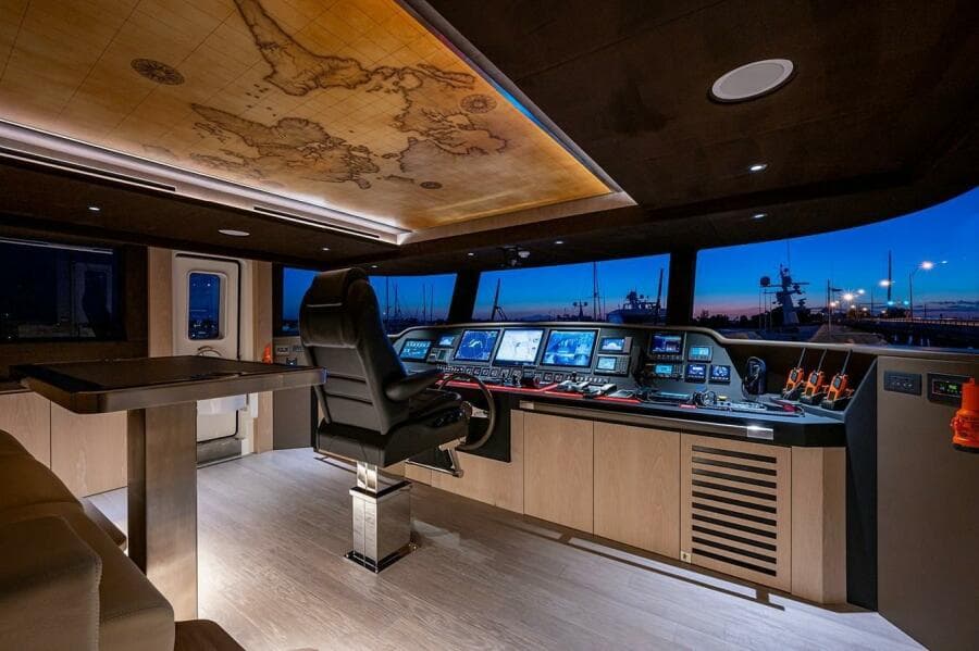 Luxurious 2020 Majesty 140 yacht cockpit with advanced navigation systems and elegant interior design.