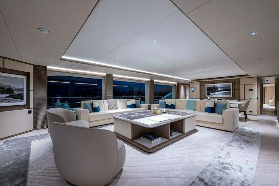 Luxurious interior of 2020 Majesty 140 yacht with modern furnishings and panoramic windows.
