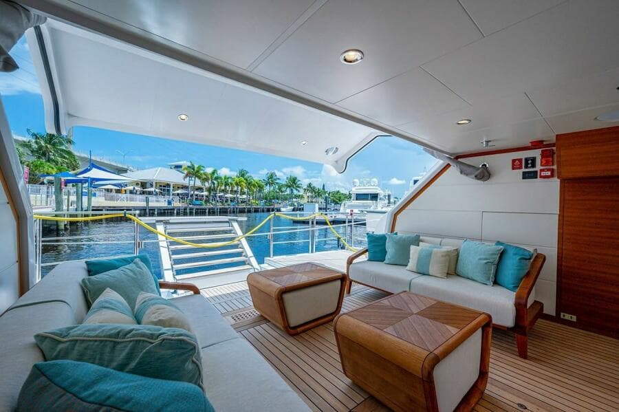 Luxurious 2020 Majesty 140 yacht interior with elegant seating and waterfront view.