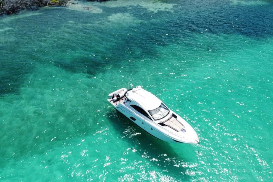 Beneteau Gran Turismo 44 yacht cruising in clear turquoise waters, 2014 model.