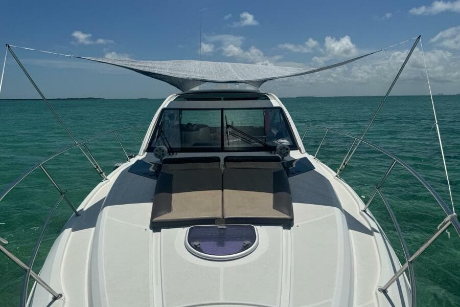 2014 Beneteau Gran Turismo 44 yacht on turquoise water under clear sky.
