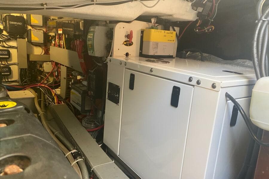 Engine room of 2014 Beneteau Gran Turismo 44 with electrical components and wiring.