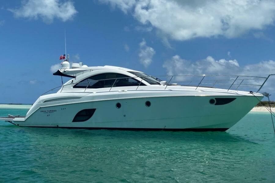 2014 Beneteau Gran Turismo 44 yacht on turquoise water under blue sky.