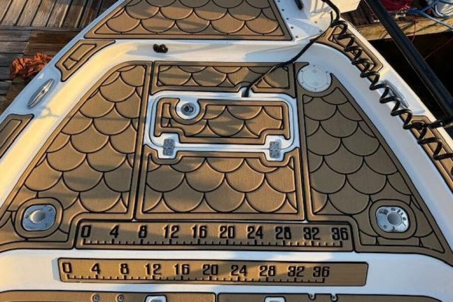 2018 Sea Hunt BX 25 FS boat deck with fish scale pattern and measurement markings.