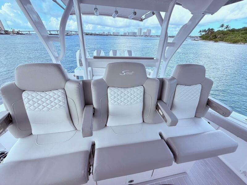 2024 Scout 400 LXF boat interior with luxurious seating and ocean view.