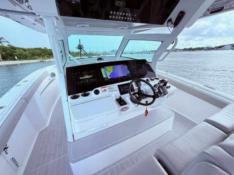 2024 Scout 400 LXF boat helm with advanced navigation system and luxurious seating.