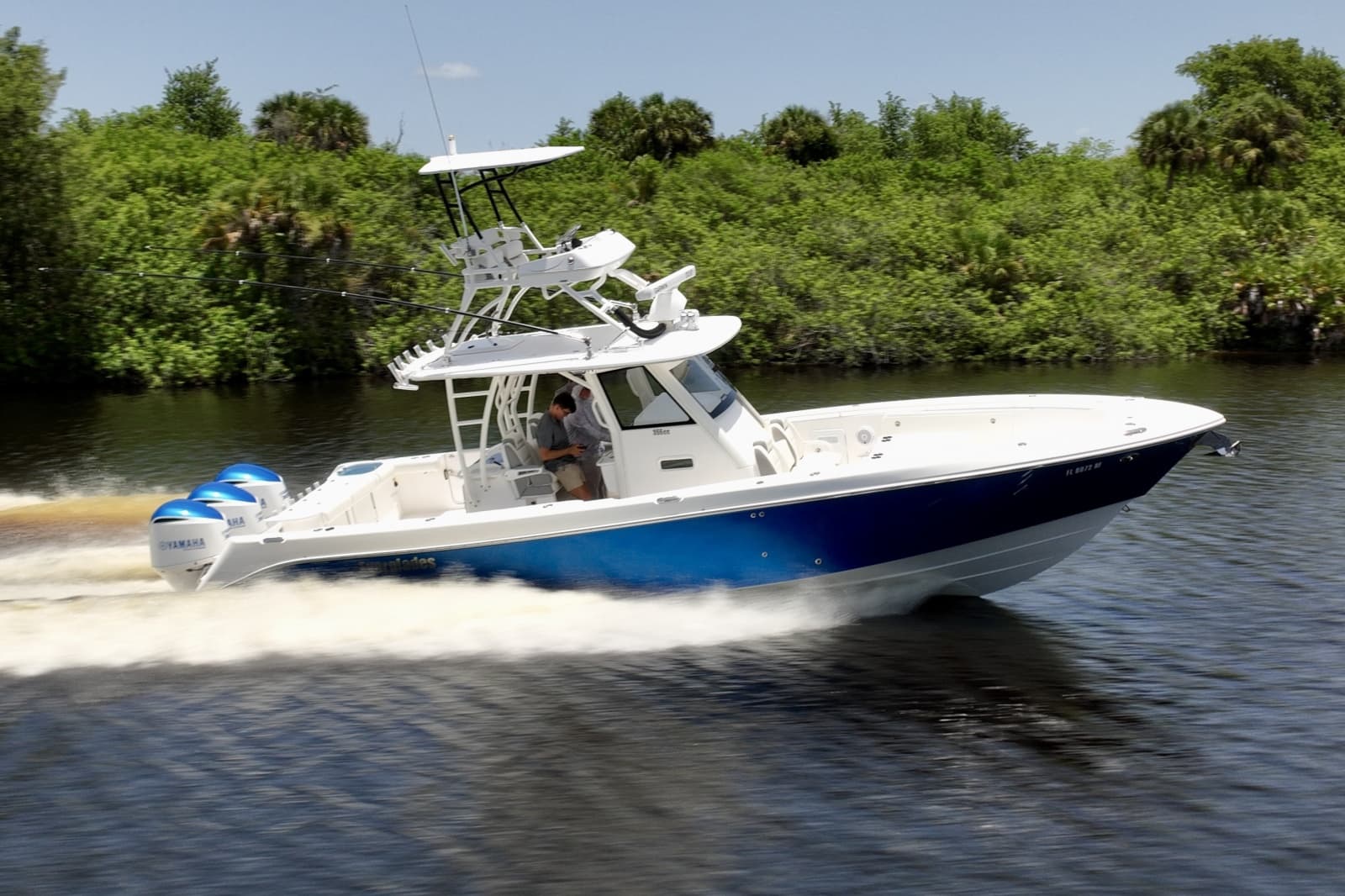 Mid Atlantic Blue Awlcraft hull underway, full port profile.