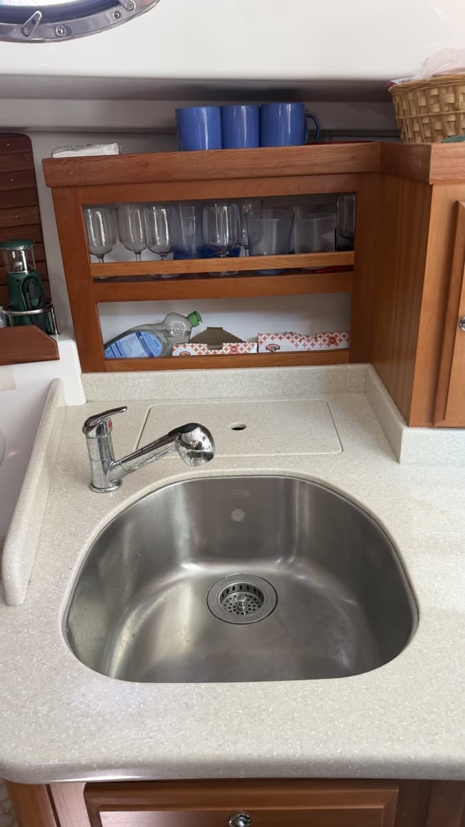 Liberty cabin galley sink w/outboard trash bin and shelves