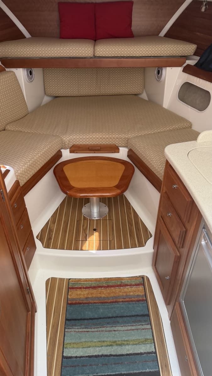 Liberty cabin showing vee berth and dining table