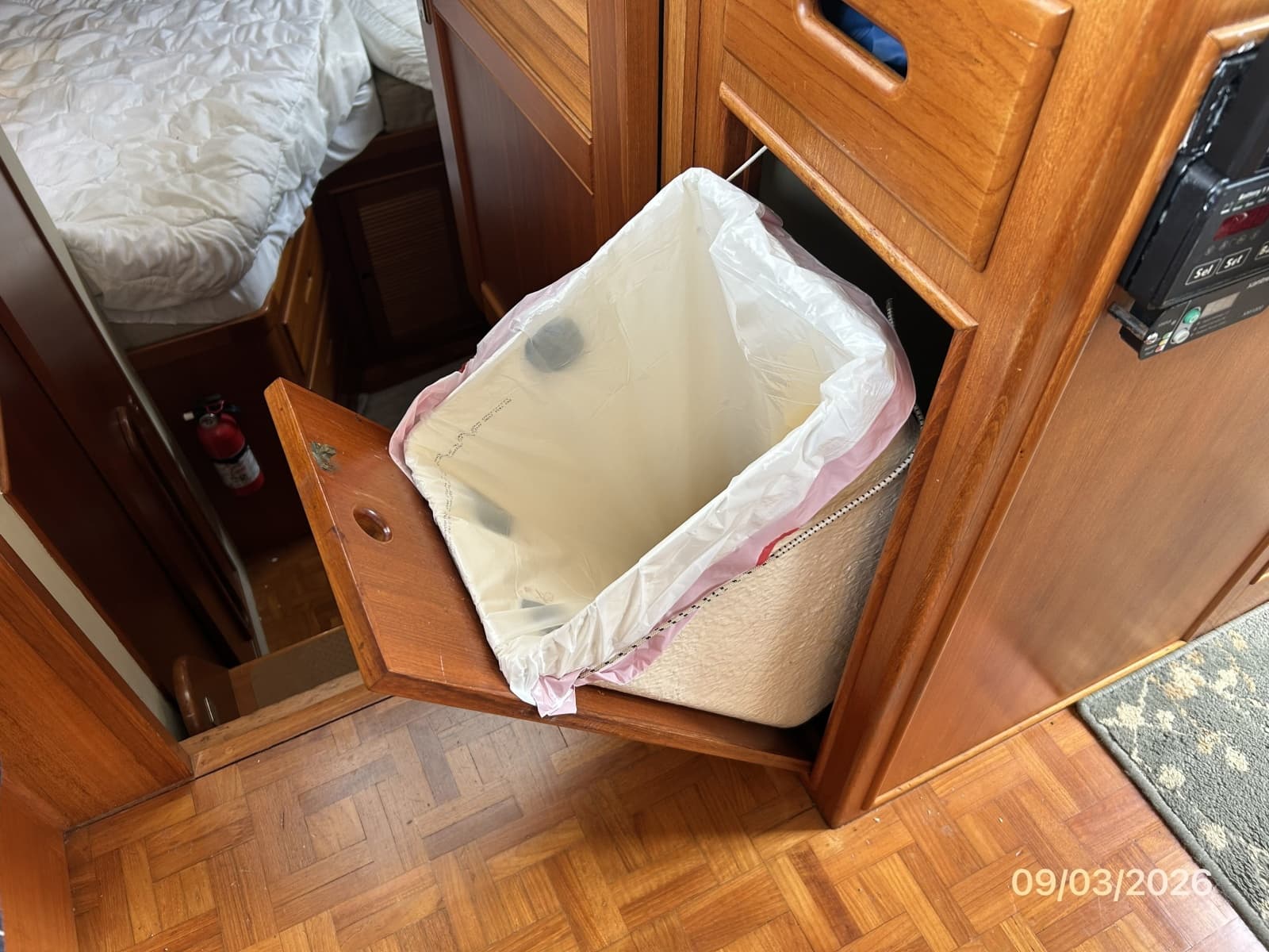 42' Grand Banks galley trash compartment