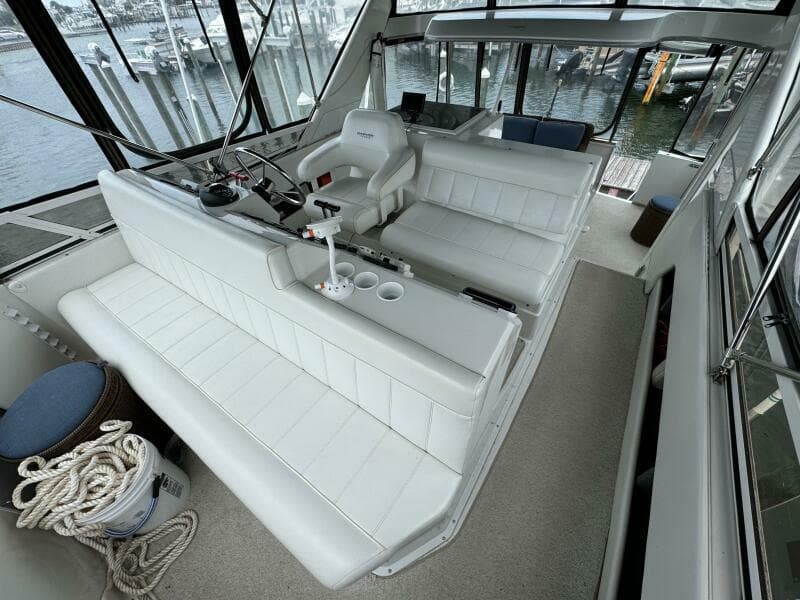 23 1999 Carver 406 Helm Looking Aft