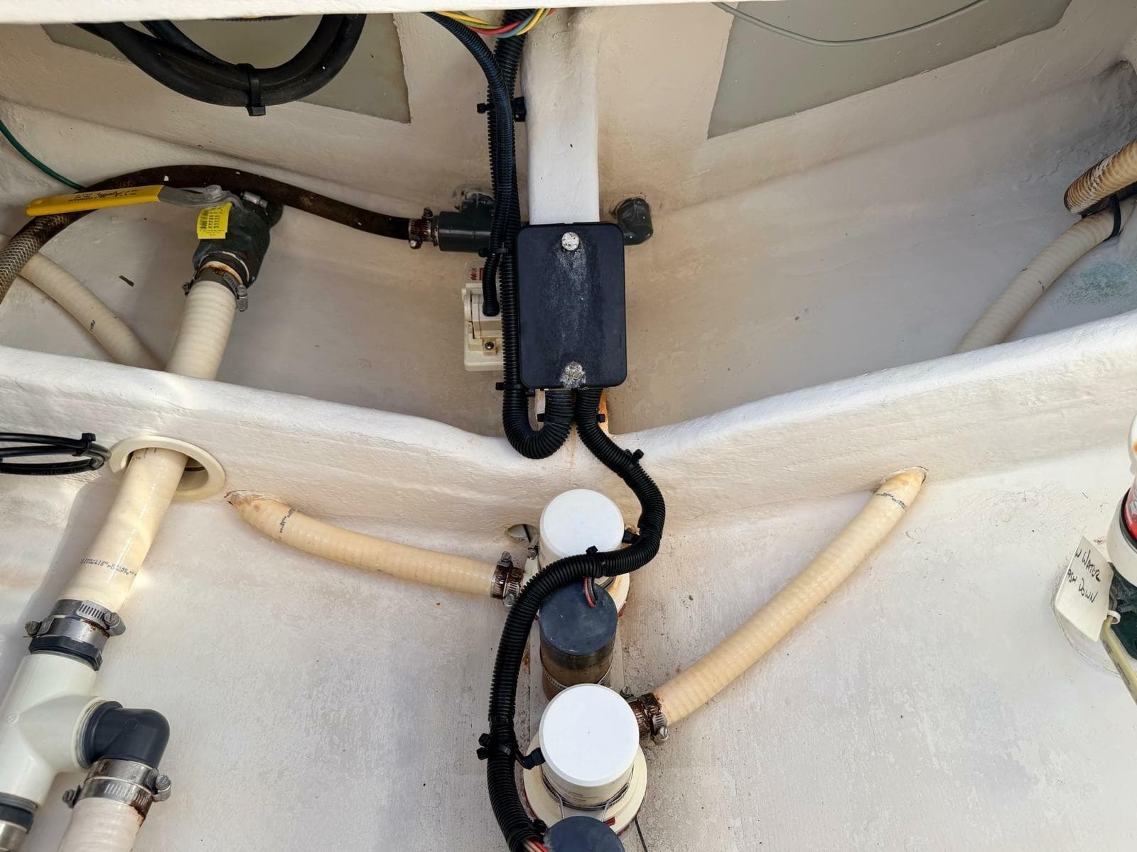 2017 Intrepid 327 Center Console for sale in Pompano Beach FL - wiring and plumbing runs inside an access compartment
