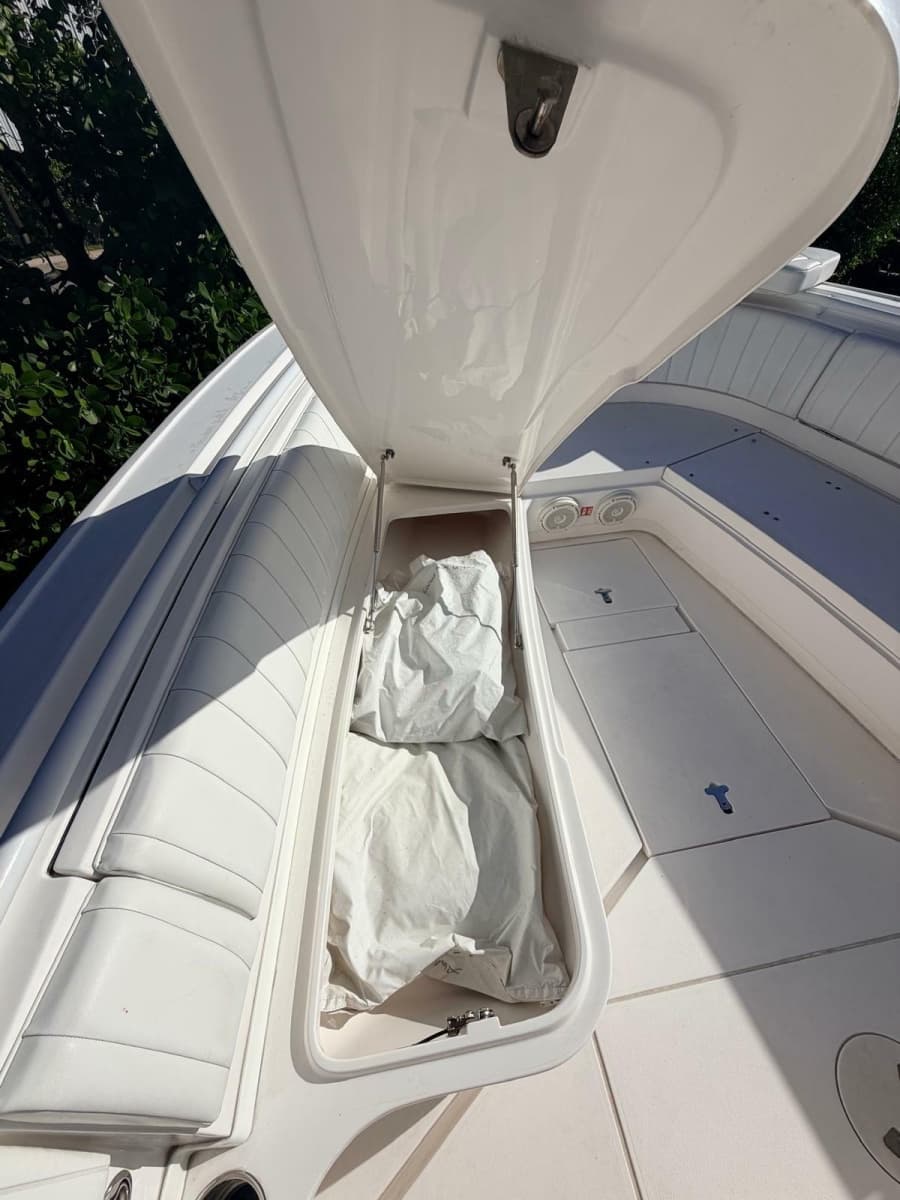 2017 Intrepid 327 Center Console for sale in Pompano Beach FL - forward deck hatch open with storage