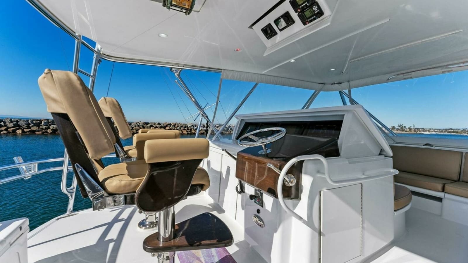 2007 Hatteras 64 Convertible CHUPACABRA - Flybridge Helm with Seating