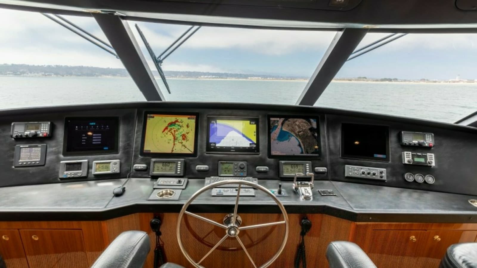 2006 Viking 74 Enclosed Bridge "KickBack" - Enclosed Bridge Helm Station