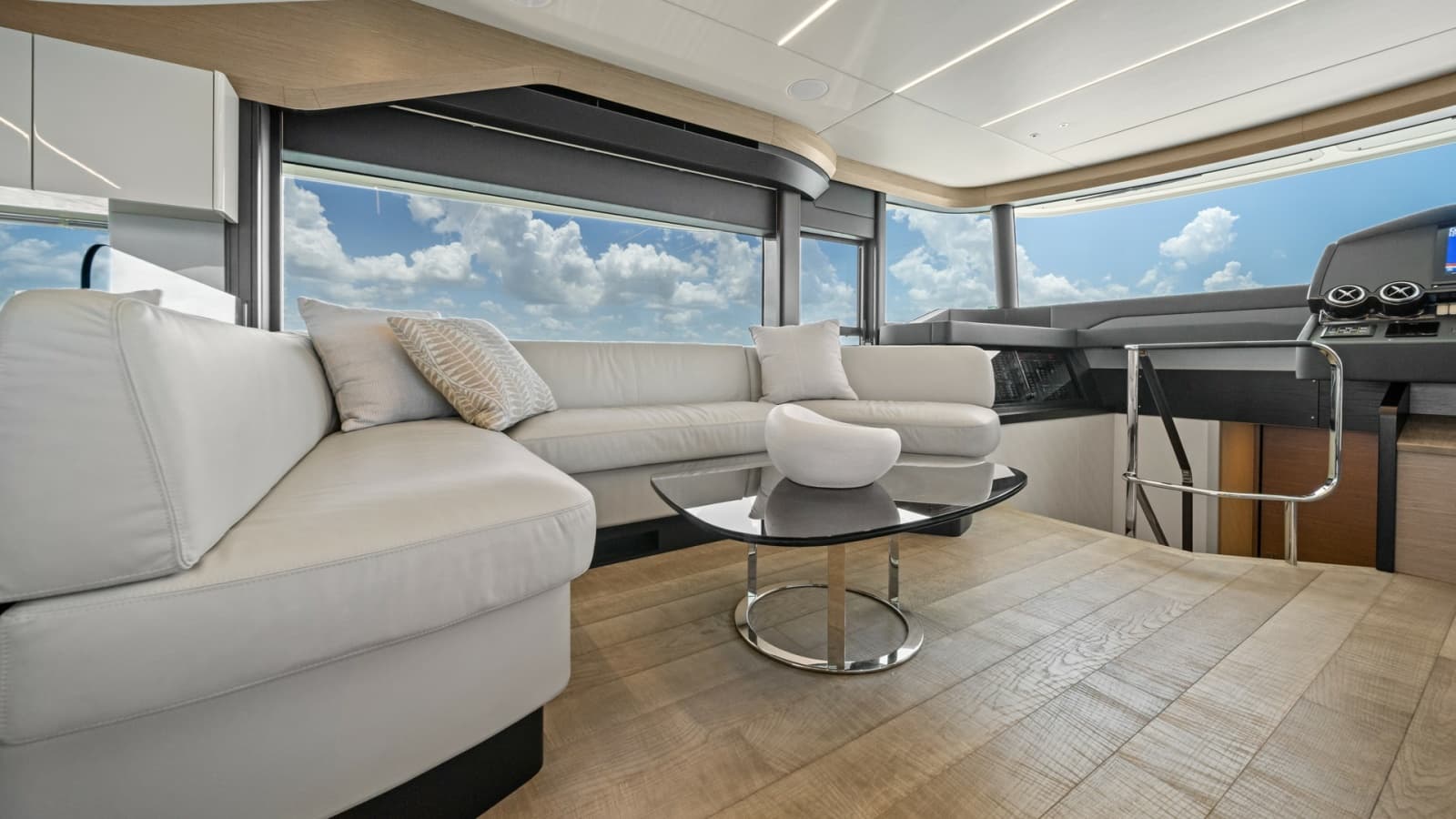 2026 Absolute Navetta 58 "ANDIAMO" - Elegant L-Shaped Sofa and Staircase to Lower-Level Berthing Area