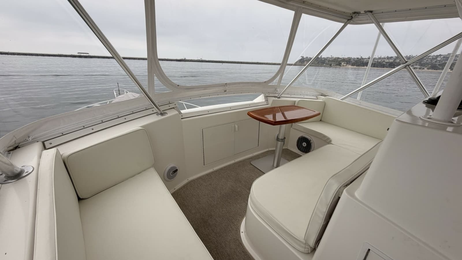 1994 Viking 50 Convertible "Wild Rice" - Flybridge Seating Area with Table