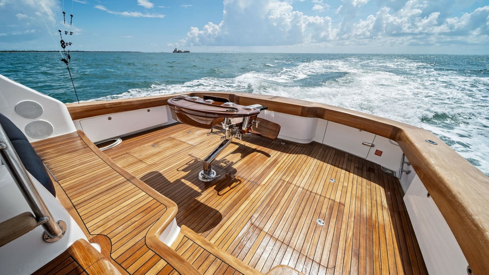 Spacious Teak Cockpit with Rod Holders