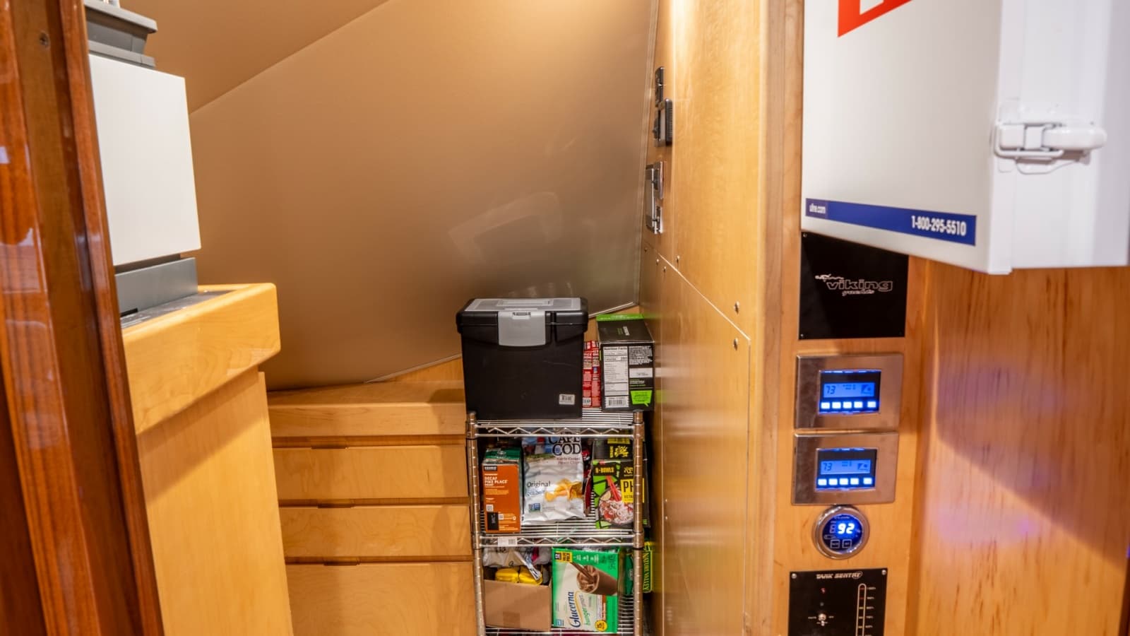 2020 Viking 92 Skybridge "After Midnight" - Spacious Utility Storage Closet.