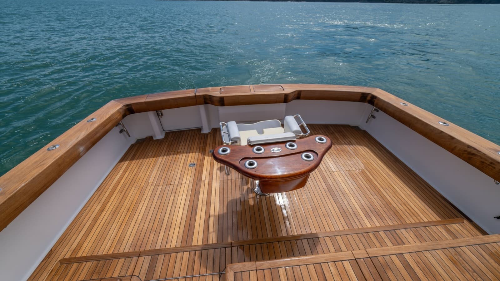 Spacious Teak Cockpit with Fighting Chair 2002 Viking 61 Convertible