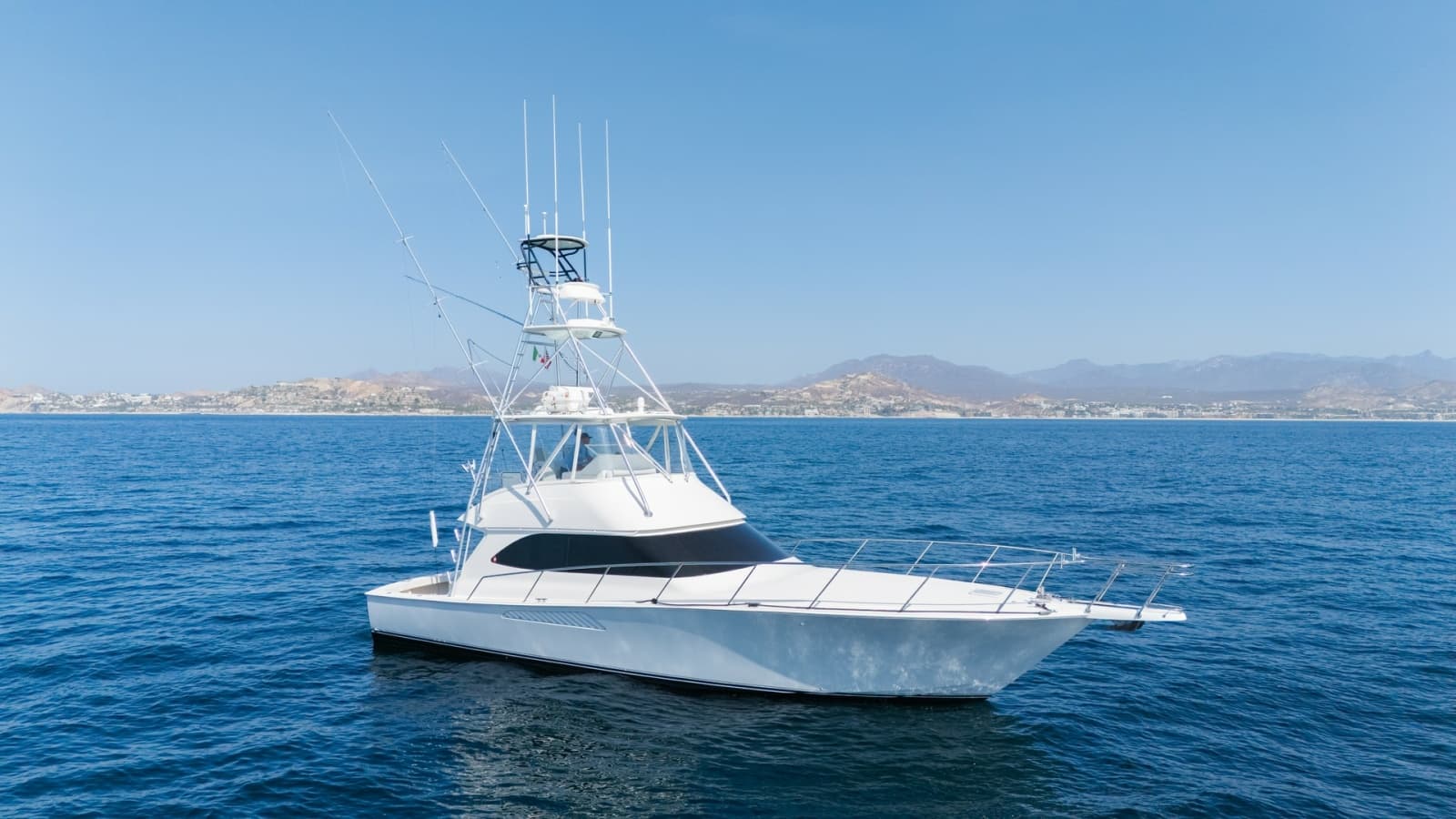 2009 Viking 50 Convertible "Jammin" - The Sleek and Elegant Starboard Profile Showcases the Yacht's Timeless Design and Commanding Presence on the Water.