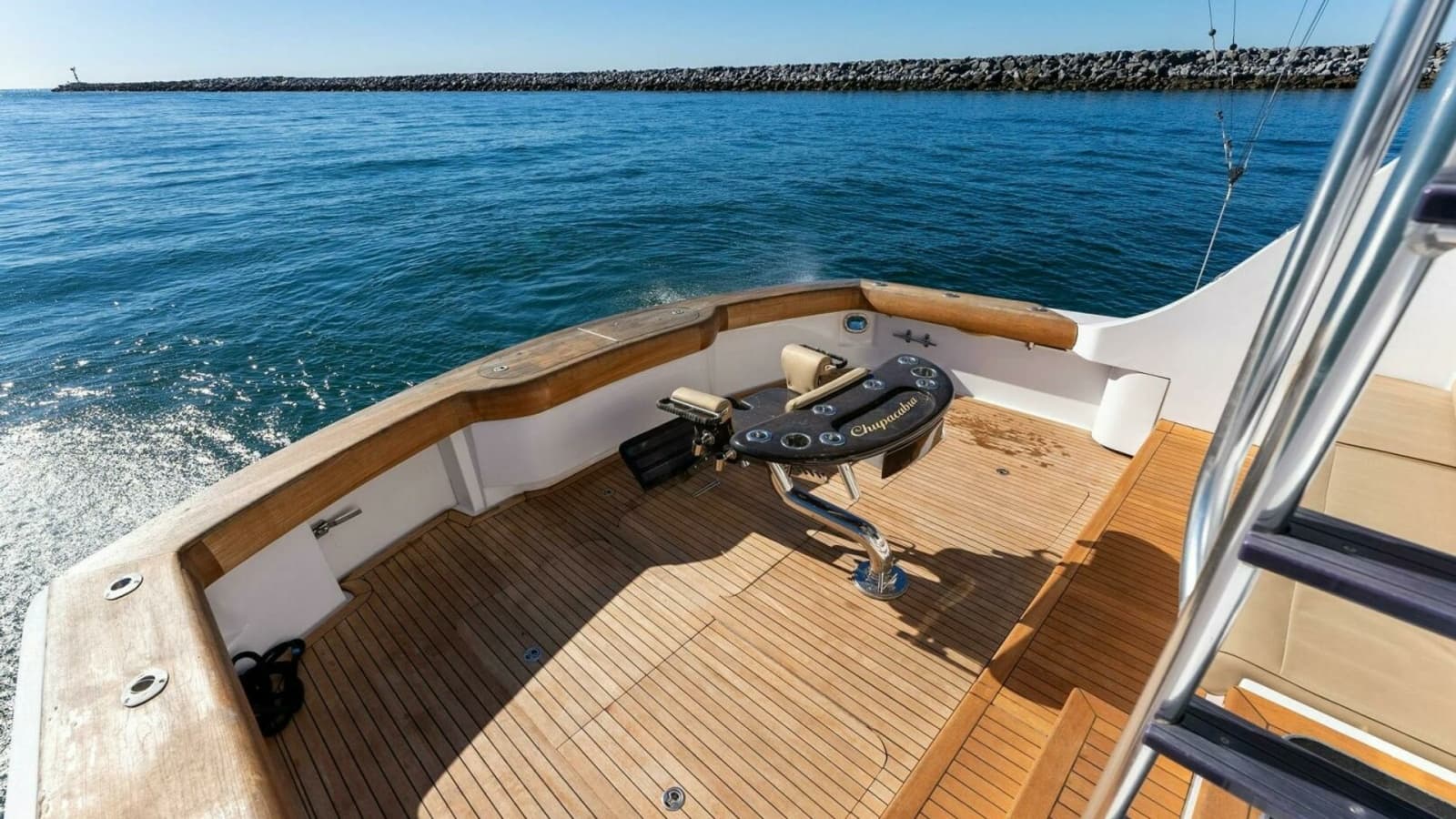 2007 Hatteras 64 Convertible CHUPACABRA Spacious Teak Cockpit with Fighting Chair