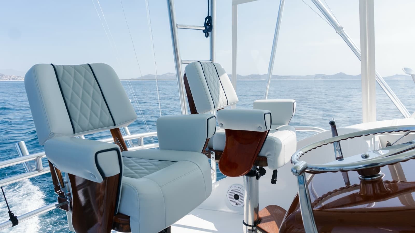 2009 Viking 50 Convertible "Jammin" - The Flybridge features Premium Captain's Chairs that Combine Comfort, Functionality, and Commanding Sightlines for an Elevated Boating Experience