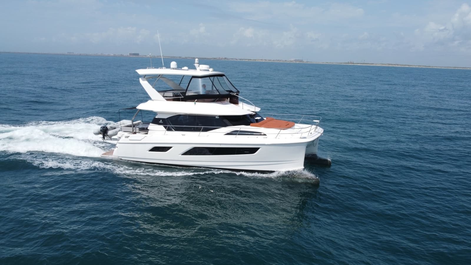 Aquila 44 CAT Cruising Side View