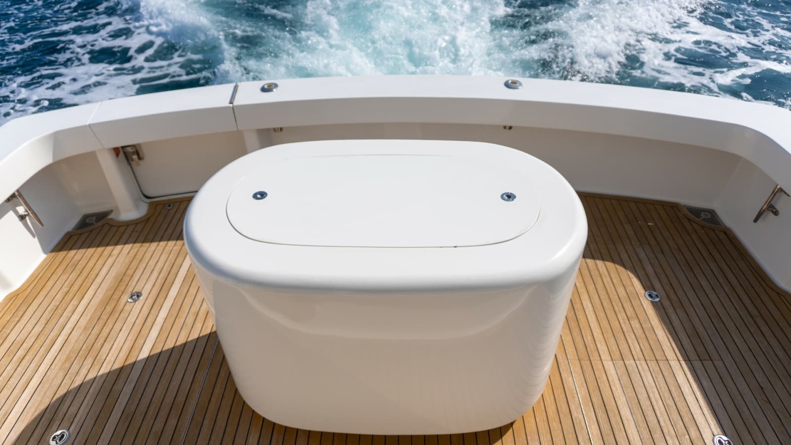 Spacious Aft Deck with Teak Flooring and Livewell Tank
