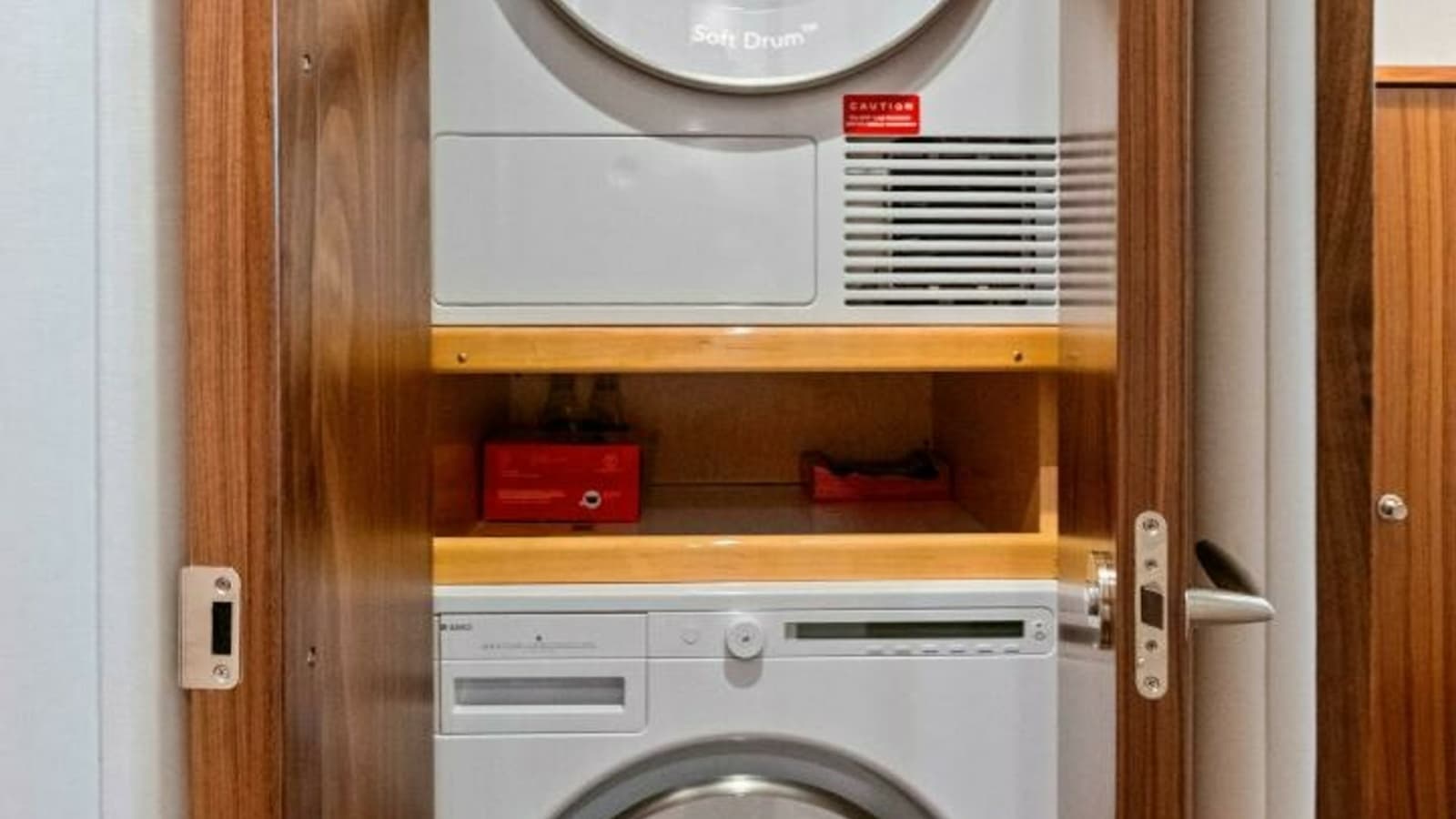 Stacked Laundry Appliances in Cabinet