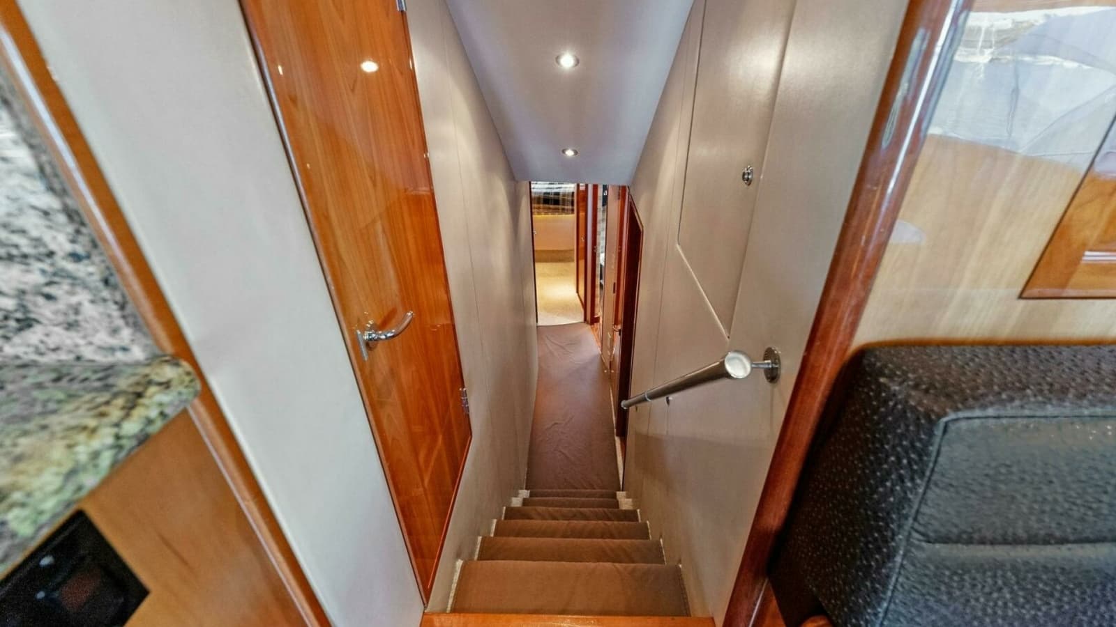 2007 Hatteras 64 Convertible CHUPACABRA - Lower Deck Stairway and Hallway