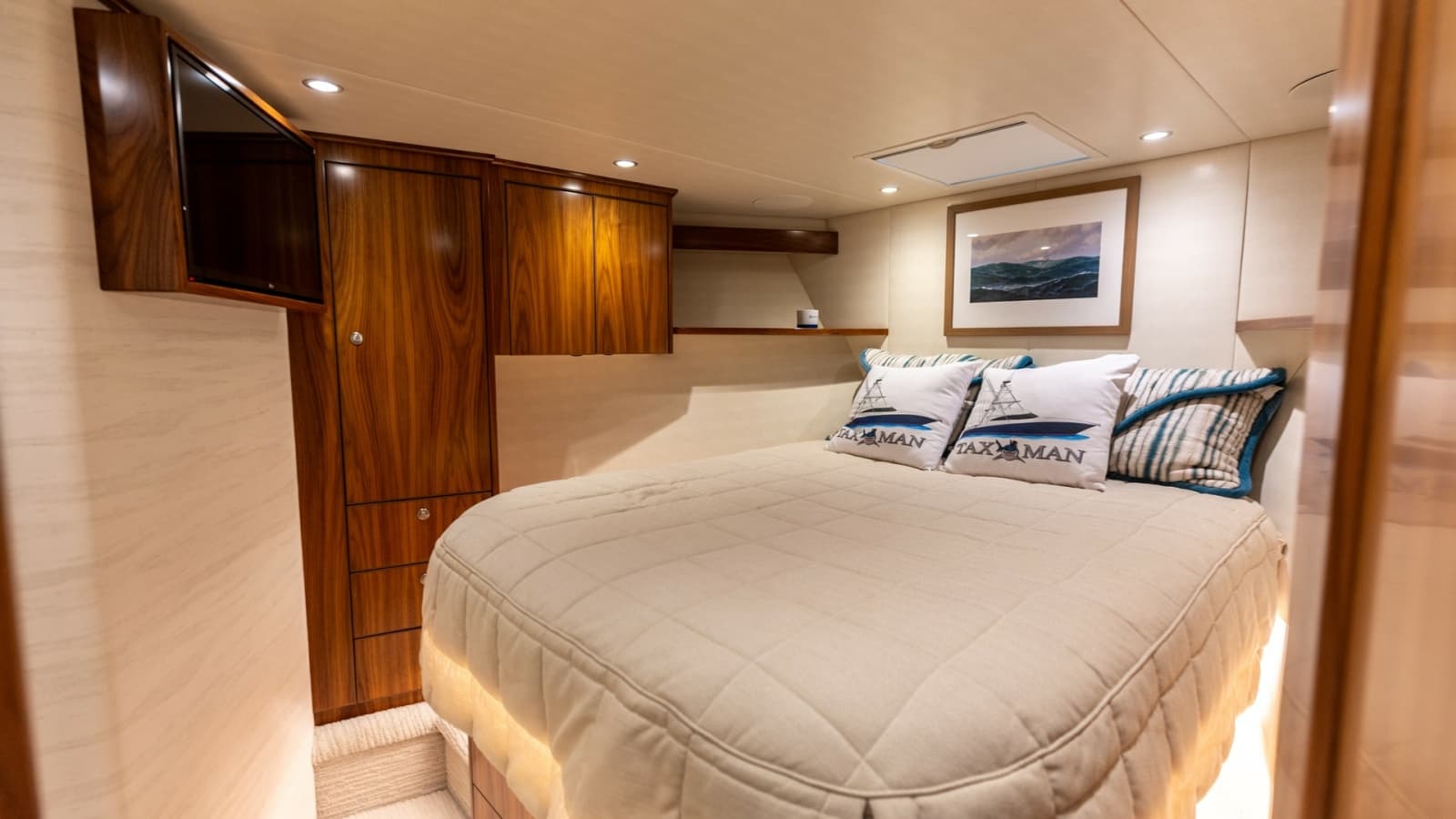 Elegant Forward Stateroom with Rich Wood Accents