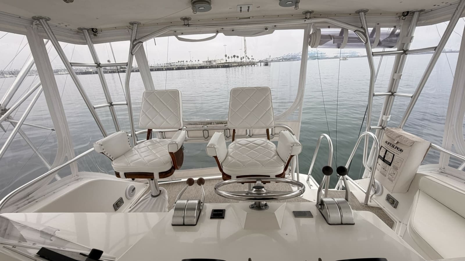 1994 Viking 50 Convertible "Wild Rice" - Flybridge Helm Captain Chairs