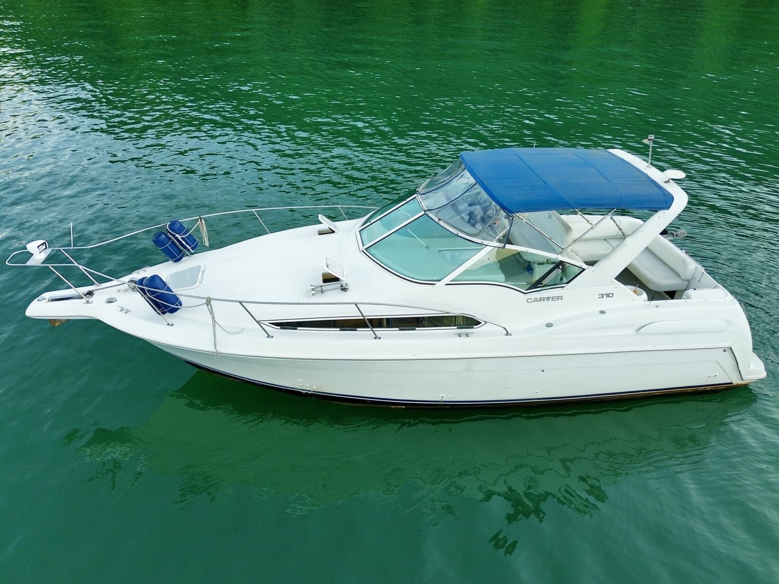 1996 Carver 310 Mid Cabin Express